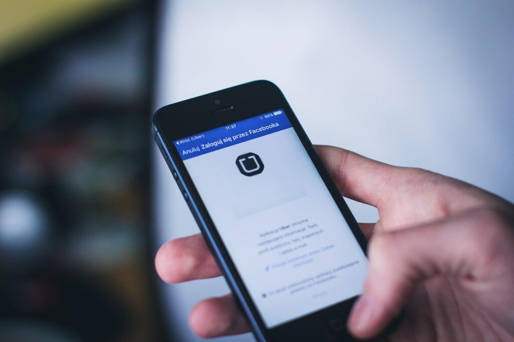 app, apple, facebook, hand, holding, ios, iphone, login, man, mobile, phone, technology, uber, blue phone, blue apple, blue mobile, blue facebook, blue social, blue smartphone, blue media, blue telephone, blue iphone, login, login, login, uber, uber, uber, uber, uber