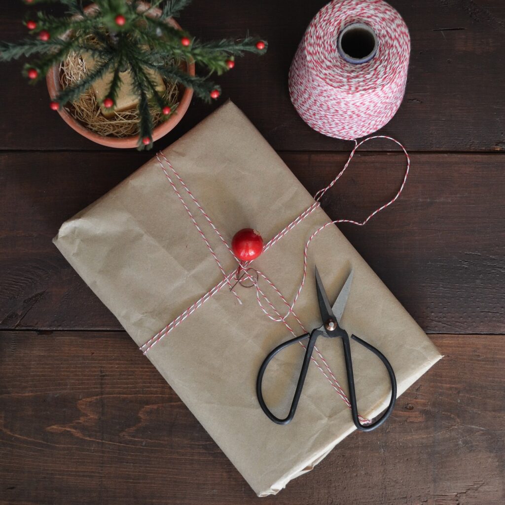 gift, package, wrapping, scissors, from above, wood, holidays, table, brown paper, string, red, brown table, brown gift
