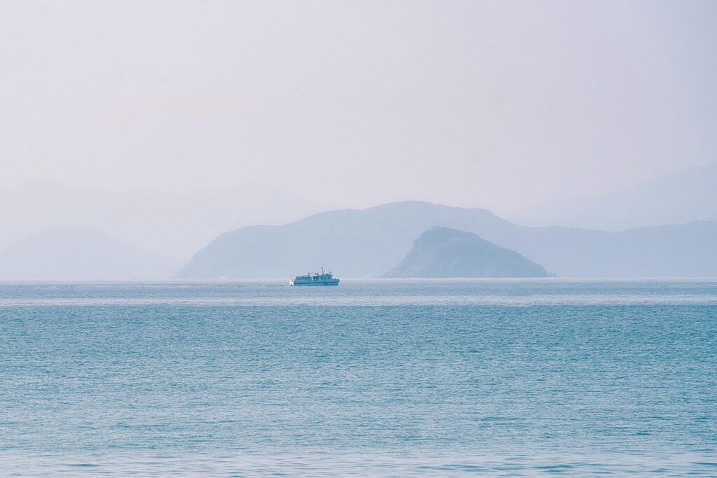 sea, mountain, ocean, scenery, sea view, hazy, fog, mist, minimalist, nature, minimalism, simplicity